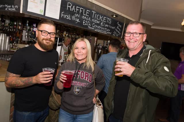 Denise and her husband Tim are hoping to raise 10,000 for Rowan's Hospice which cared for frequent customer Doreen before she died in January last year - (L-R) Dean McFarlane, Nyomi Alcroft and Graham Alcroft.