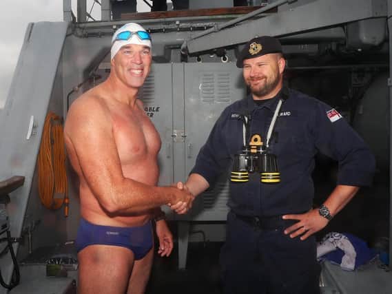Lewis Pugh with the crew of Portsmouth-based minehunter HMS Hurworth. Photo: Royal Navy