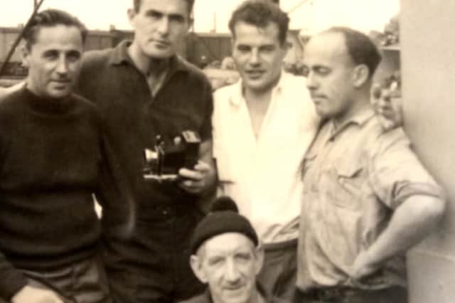Captain and crew of the St Ernest: From left, Captain Carr, anon, Mark Allen in white shirt, ships engineer unknown, Joe the cook at the front. Picture: Jane Collins