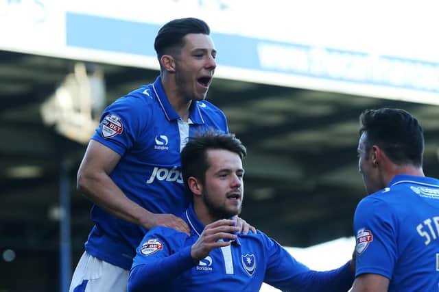 Conor Chaplin celebrates on the shoulders of Marc McNulty. Picture: Joe Pepler