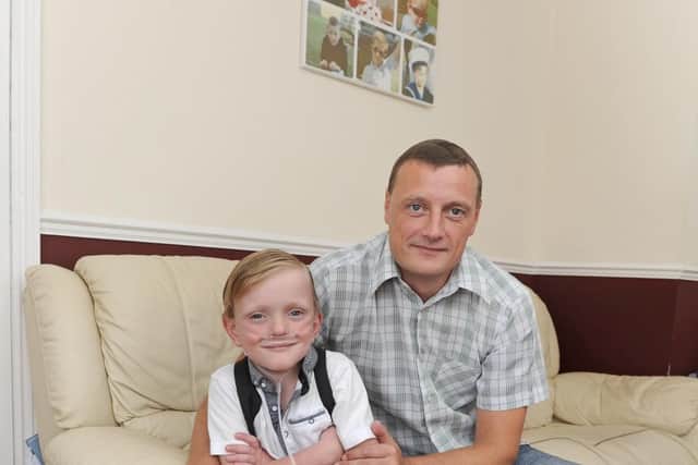 Sam Merrick with his dad Paul Merrick. Picture: Ian Hargreaves