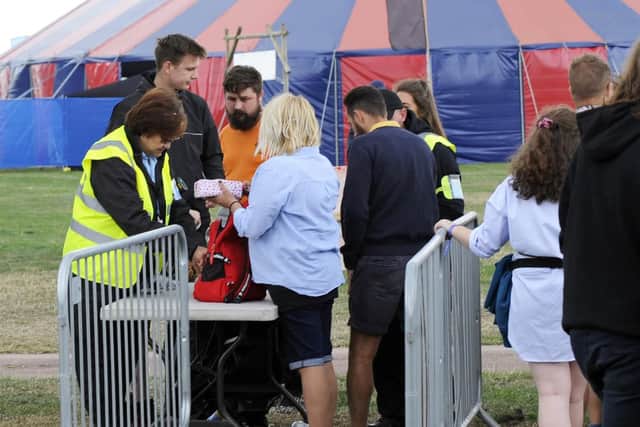 Routine bag checks at Victorious Festival. There is no suggestion these people took any drugs into the festival. Picture: Malcolm Wells