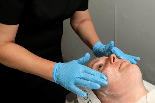 Paula Price gives a Million Dollar Facial to the News' business editor Kimberley Barber