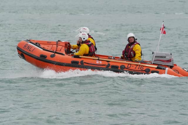 Portsmouth RNLi crews pictured during the rescue operation in the harbour. Photo: Habibur Rahman