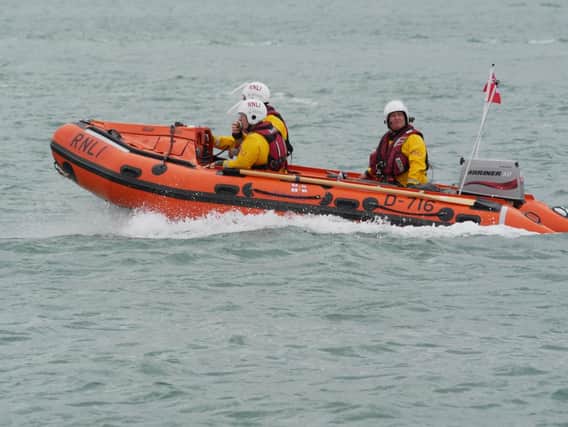 Portsmouth RNLi crews pictured during the rescue operation in the harbour. Photo: Habibur Rahman