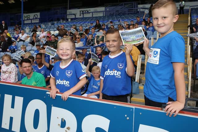 Craig Harding 5, Jayden Walters 7 and Ben Harris 7 waiting for their heroes. Picture: Habibur Rahman