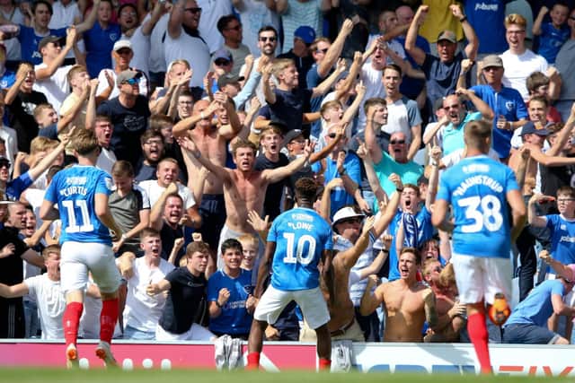 Fans celebrate at Fratton Park. Picture: Andrew Fosker/PinPep