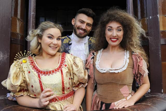 Jake Quickenden as ' The Prince', with (left) Natasha Barnes as 'Fairy Godmother' and (right) Kaya Rose as 'Cinderella' Picture: Malcolm Wells