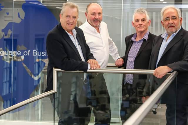 TAKING STOCK. L-r: Roy Garlick, Transalis Global Channel Manager, with i-Stocktakes Managing Director Mike McNiven, Product Development Director Roy Burrows and Contract Technical Director, Panos Georgiou.
