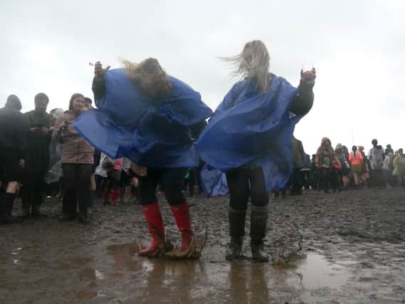Amy Ashby and Beth Watson making a muddy splash Victorious Festival 2018