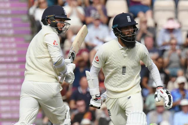 Moeen Ali and Sam Curran, left, shared a stand of 81 for the seventh wicket. Picture: Neil Marshall