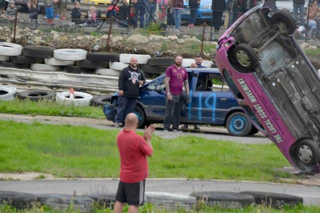 Crowds watch in disbelief as Sophie's car flips. Picture: www.shuttersphotography.co.uk / Makaela Papworth