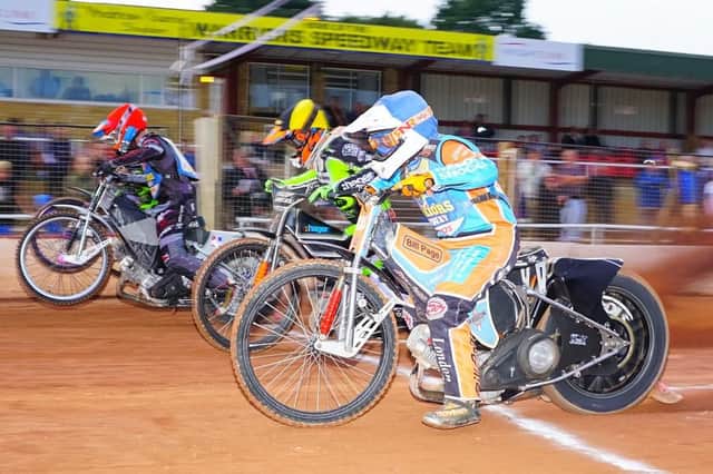 Alfie Bowtell, red, and Danno Verge, blue, in action against Eastbourne. Picture: Ian Groves/Sportography