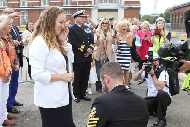 Andrew Clark proposes to Kayleigh Stollery after eight months on board HMS Middleton. Picture: Habibur Rahman