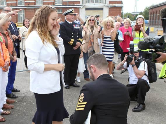 Andrew Clark proposes to Kayleigh Stollery after eight months on board HMS Middleton. Picture: Habibur Rahman