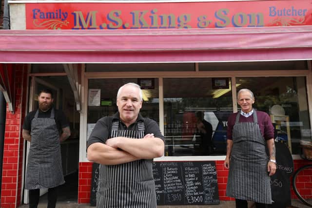 Butchers Kevin King, centre, his father, Malcolm, right, and James Smith are pictured outside the shop. Picture: Chris Moorhouse
