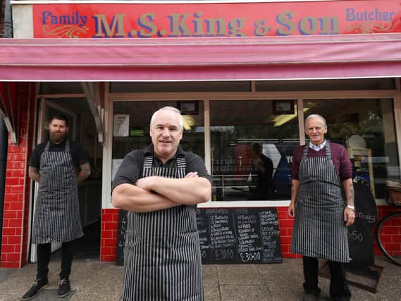 Butchers Kevin King, centre, his father, Malcolm, right, and James Smith are pictured outside the shop. Picture: Chris Moorhouse