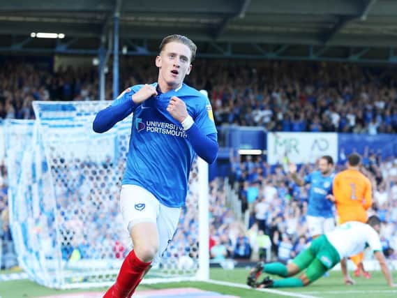 Pompey man of the match Ronan Curtis celebrates his second goal against Plymouth. Picture: Joe Pepler