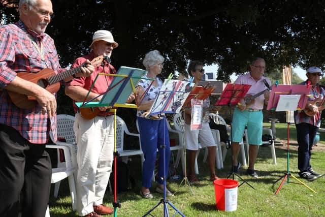 The Hayling Huggers play at a barbecue party for Emsworth carers in the garden next to the former cottage hospital, Emsworth  Picture: Chris Moorhouse