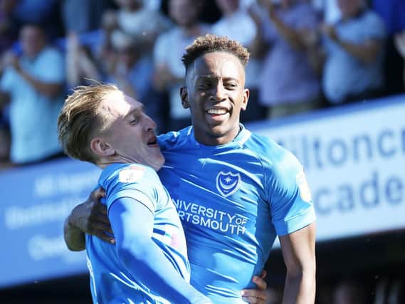 Ronan Curtis, left, and Jamal Lowe celebrate during Pompey's 3-0 victory over Plymouth. Picture: Joe Pepler