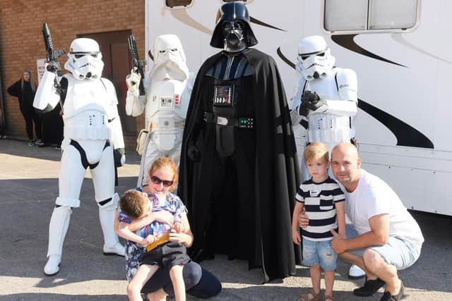 Star Wars characters with Vicky and Archie Cleaver (left) and Shaw and Steve Beech. Picture: Keith Woodland