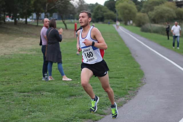 Lachlan Wellington winning the Lakeside 5k race. Picture: David Brawn