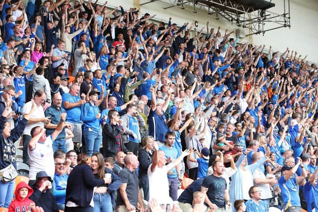 Heart and soul: Pompey passion at Fratton Park against Blackpool last month.