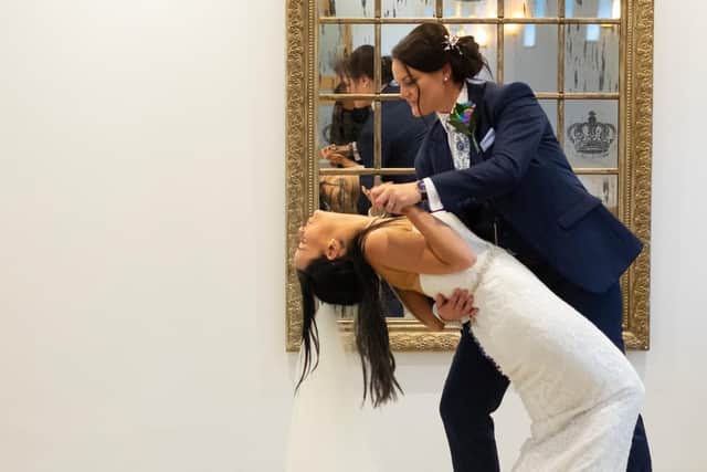 Joelene Brazier and Sarah-Jane Brazier show off their happiness at their wedding in Chichester.
