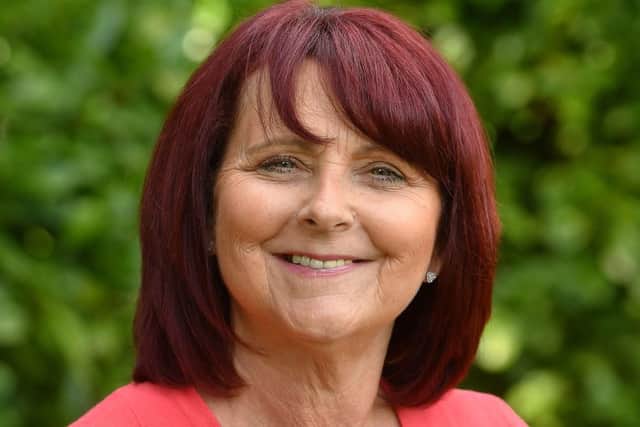 Jo Hext, 54, from Hampshire in the grounds of Papworth Hospital in Cambridgeshire, six months after having major transplant surgery. Picture: John Stillwell/PA Wire