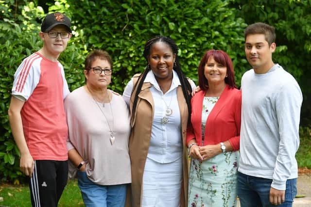 (left to right) Luke Palfreyman, Yvonne Dunham, Michelle Hemmings, Jo Hext and Daniel Peel meet up in the grounds of Papworth Hospital in Cambridgeshire, six months after they all had major transplant surgery. Picture: John Stillwell/PA Wire