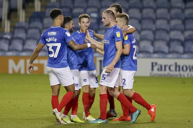 Matt Clarke is congratulated after putting Pompey in front. Picture: Robin Jones/Digital South