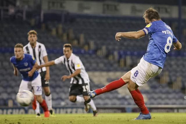 Brett Pitman nets his first goal of the season during Pompey's 4-0 win over Gillingham. Picture: Robin Jones/Digital South