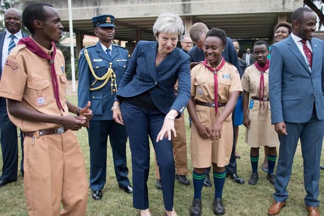 Theresa May showing off her moves in Africa