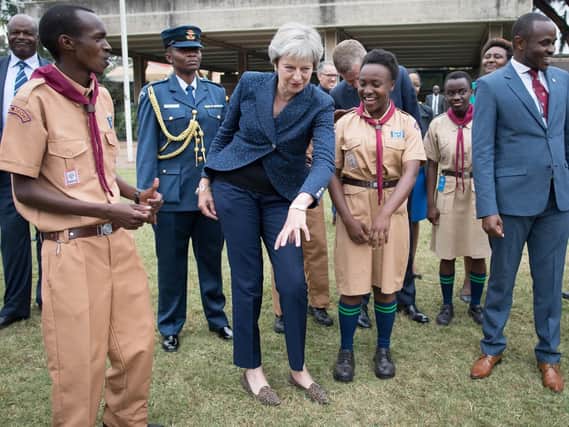 Theresa May showing off her moves in Africa