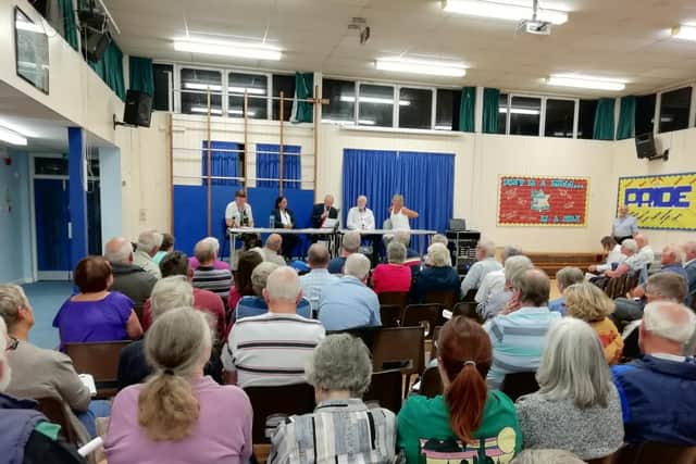 Residents meet at Peel Common Junior School to discuss Fareham Borough Council's draft local plan, which includes 475 homes in the land next to Tukes Avenue. Picture: David George