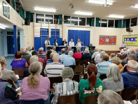 Residents meet at Peel Common Junior School to discuss Fareham Borough Council's draft local plan, which includes 475 homes in the land next to Tukes Avenue. Picture: David George