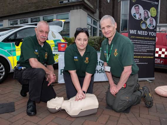 Community First Responders Peter Lewis, Vickie Bray and Michael Miotk with resuscitation dummy. Picture: Vernon Nash