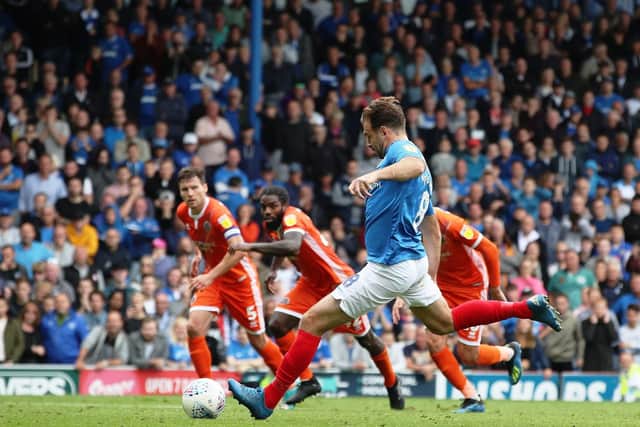 Brett Pitman rescued Pompey a point against Shrewsbury. Picture: Joe Pepler