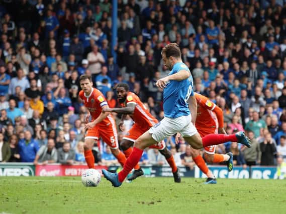 Brett Pitman rescued Pompey a point against Shrewsbury. Picture: Joe Pepler