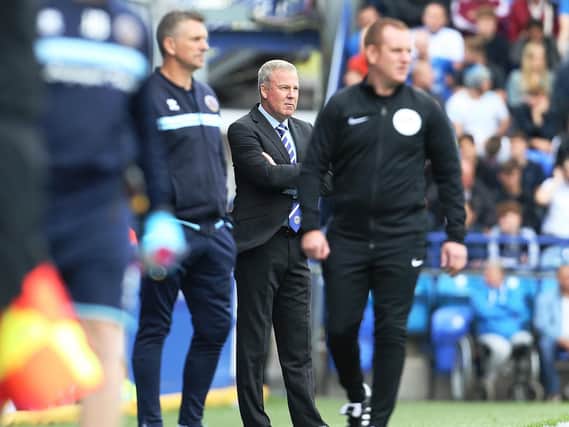 Pompey boss Kenny Jackett, centre, today as his team drew with Shrewsbury. Picture: Joe Pepler