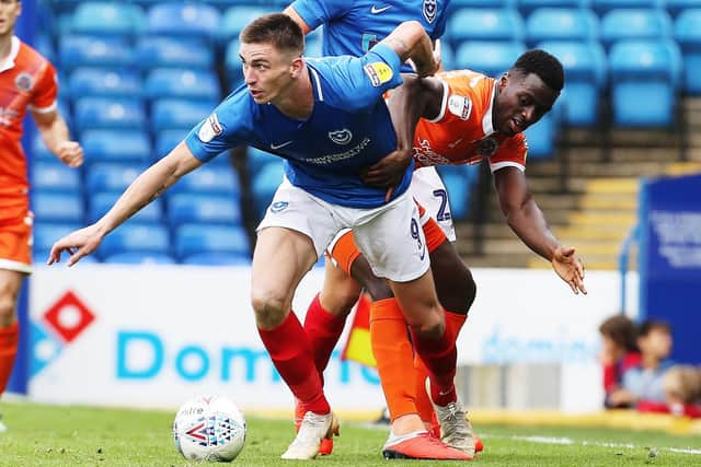 Oli Hawkins battles for possession in today's draw with Shrewsbury.  Picture: Joe Pepler