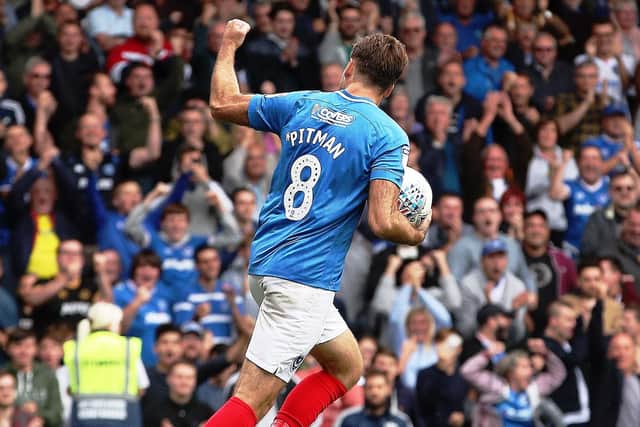 Brett Pitman celebrates scoring from the penalty spot against Gillingham Picture; Joe Pepler