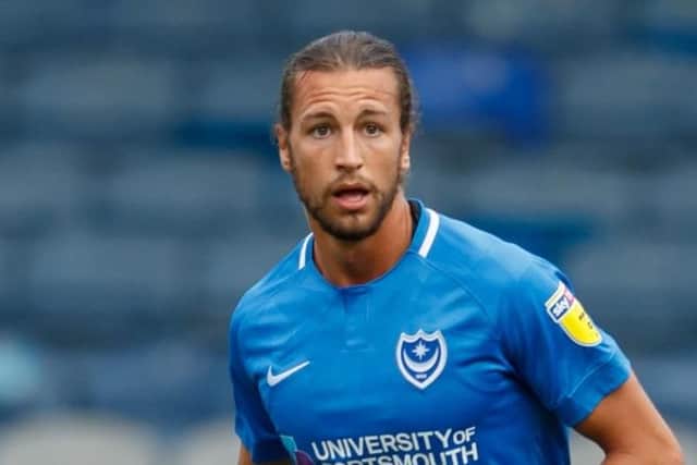 Christian Burgess was distraught following his mistake against Shrewsbury. Picture: Joe Pepler.