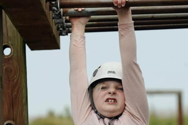 Kiera Smith (seven) from Leigh Park tries the assault course at Fort Purbrook. Picture: Ian Hargreaves