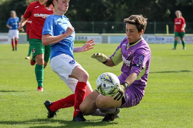 Rachel Panting is challenged by the Coventry keeper. Picture: Jordan Hampton