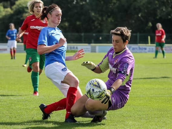 Rachel Panting is challenged by the Coventry keeper. Picture: Jordan Hampton