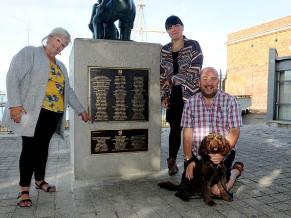From left, campaigners Margaret Foster and Sarah Shreeve, with deputy Portsmouth City Council leader Steve Pitt - with his seven-year-old cockapoo, Finn. Picture: Sarah Standing