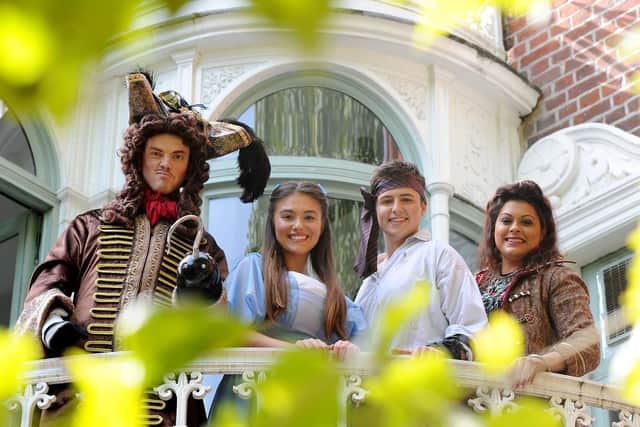 The leads in Peter Pan at New Theatre Royal. Timothy Lucas as Hook, Hannah McIver as Wendy, Samuel Bailey as Peter Pan and Ariane Barnes as Lily. Picture: Sarah Standing (180713-5304)