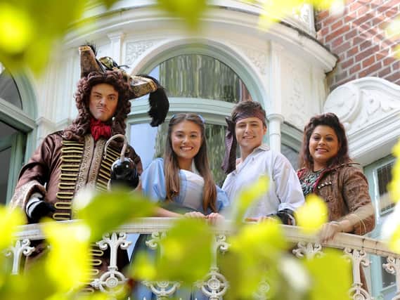 The leads in Peter Pan at New Theatre Royal. Timothy Lucas as Hook, Hannah McIver as Wendy, Samuel Bailey as Peter Pan and Ariane Barnes as Lily. Picture: Sarah Standing (180713-5304)