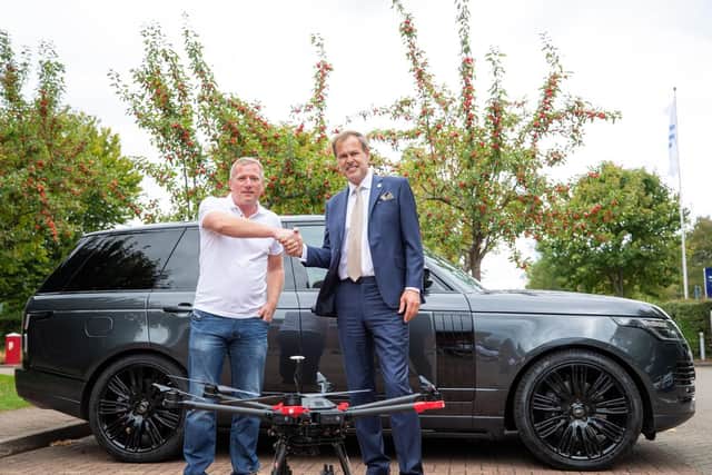 Mark Boyt, left, with business tycoon Peter Jones from Dragon's Den. Photo: Casey Gutteridge